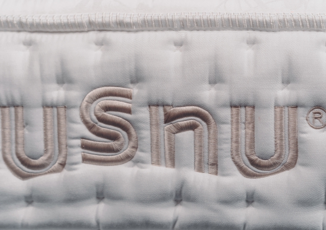 detail loga USNU na potahu ELITE precizní zpracování, USNU